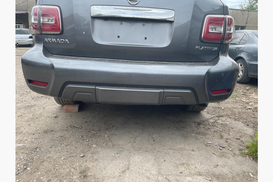Nissan Armada 2016-2024 Tylny zderzak kompletny (Oryginał 2019) Image