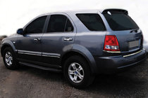 Kia Sorento I BL 2002-2009 Dolne chromowane nakładki na lampy tylne (2 szt., stal nierdzewna) zdjęcia 1