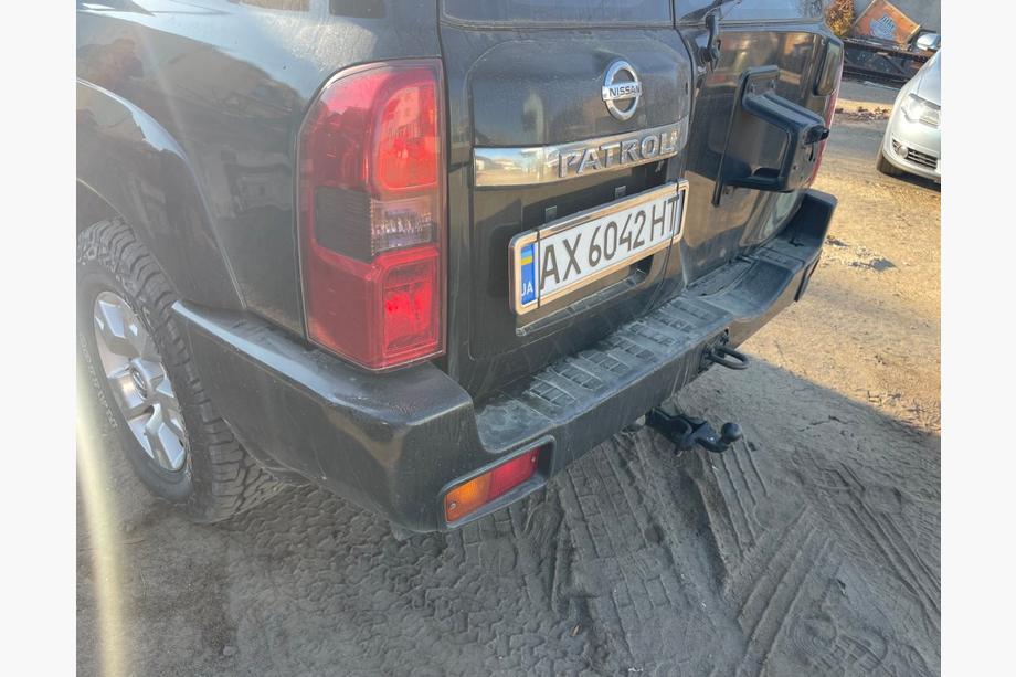 Nissan Patrol Y61 1997-2011 Tylny zderzak kompletny używany (2004-2008) Image
