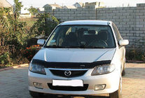Mazda 323 1977-2003 Deflektor maski (VIP) zdjęcia 1
