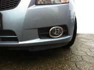 Chevrolet Cruze 2009–2015 Obramowania swiatel przeciwmgielnych (2 szt., stal nierdzewna) Carmos - Stal Turecka zdjęcia 2