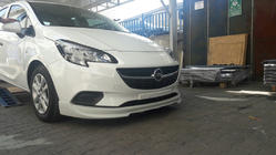 Opel Corsa E 2015-2019 Przednia dolna dokładka (do lakierowania) zdjęcia 1
