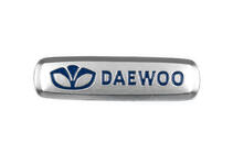 Daewoo Emblemat aluminiowy do dywaników (1 szt) zdjęcia 1