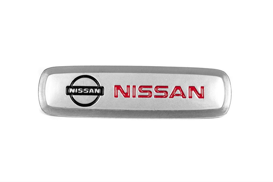 Nissan Emblemat aluminiowy do dywaników (1 szt) Zdjęcia 1