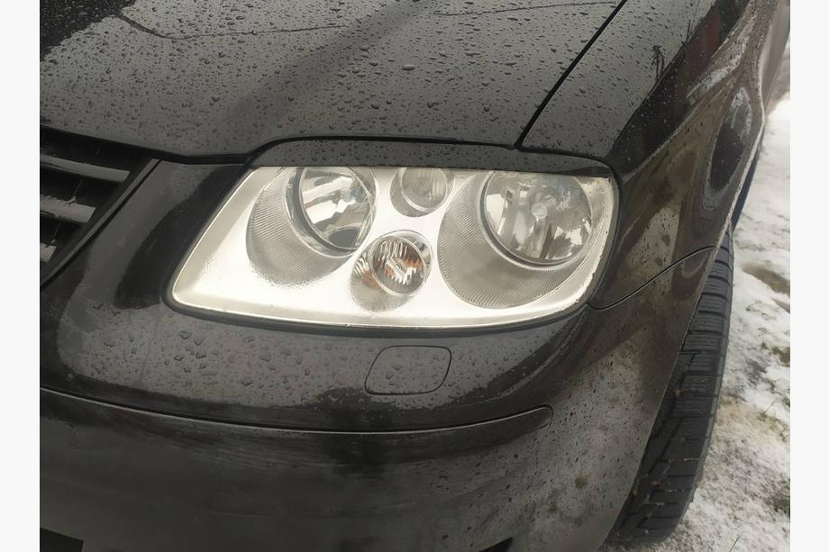 Volkswagen Caddy 2004-2010 Brewki na reflektory (czarne) Image