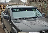 Nissan Navara 2006-2015 Daszek na przednią szybę (na ramie) zdjęcia 1