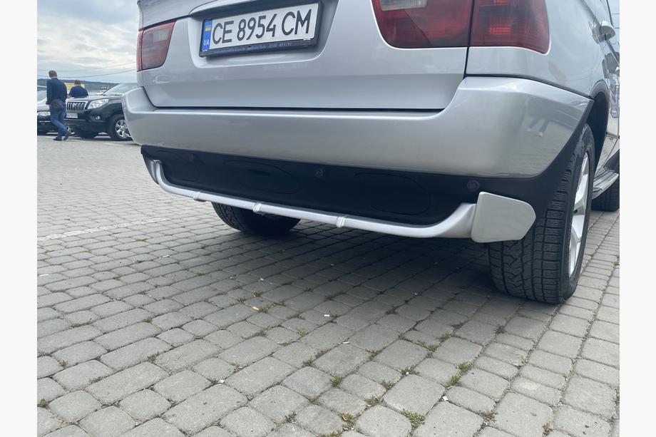 BMW X5 E53 1999–2006 Nakładka na tylny zderzak (gruntowana do lakierowania) Image