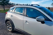 Mazda CX-3 2015- Belki poprzeczne bagażnika dachowego na relingi zintegrowane OEM (2 szt.) zdjęcia 1