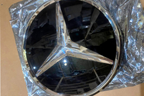 Mercedes GLE/ML class W166 2011-2018 Wyprzedaż emblemat przedni pod szkłem, chromowana ramka a0008880111 (do GLE) zdjęcia 2