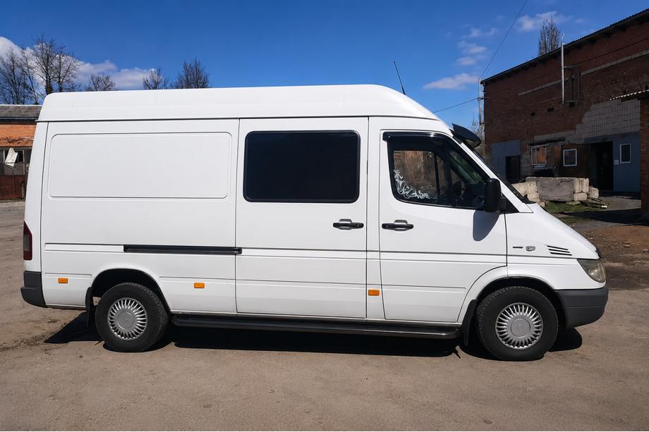Volkswagen LT 1995-2006 Stopnie boczne Premium Black (2 szt., stal nierdzewna) Średni Rozstaw Osi, Ø60 Zdjęcia 1
