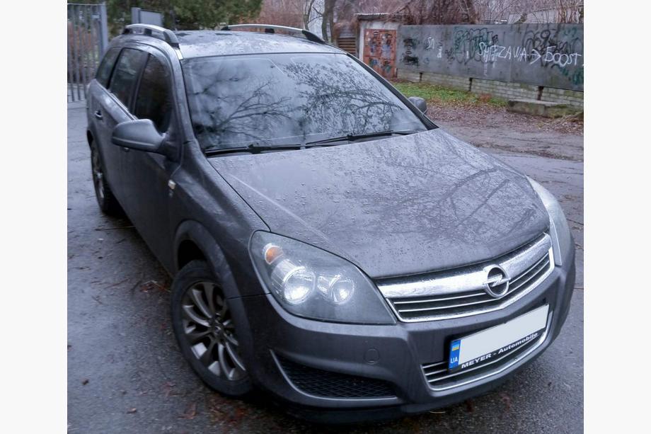 Opel Astra H 2004-2013 Relingi dachowe aluminiowe (Caravan, chrom) Image