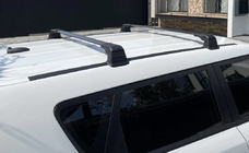 Renault Trafic 2001–2015 Bagażnik dachowy na oryginalne punkty montażowe z zamkiem (2 szt.) zdjęcia 1