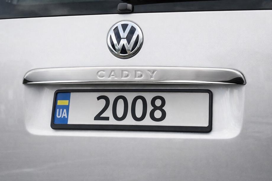 Volkswagen Caddy 2004-2010 Listwa chromowana nad tablicą rejestracyjną (1-drzwiowy, stal nierdzewna) OmsaLine - Włoska stal nierdzewna (z napisem) Image