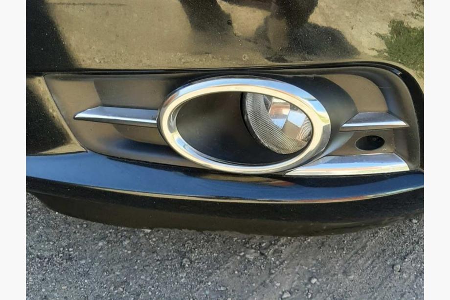 Chevrolet Cruze 2009–2015 Obramowania swiatel przeciwmgielnych (2 szt., stal nierdzewna) Carmos - Stal Turecka Image
