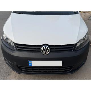 Emblemat przedni 1T0 853 601E Volkswagen Caddy 2010-2015 zdjęcia 2