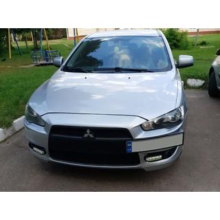 Ramka na tablice rejestracyjna (plastik) Mitsubishi Lancer X 2008- zdjęcia 3