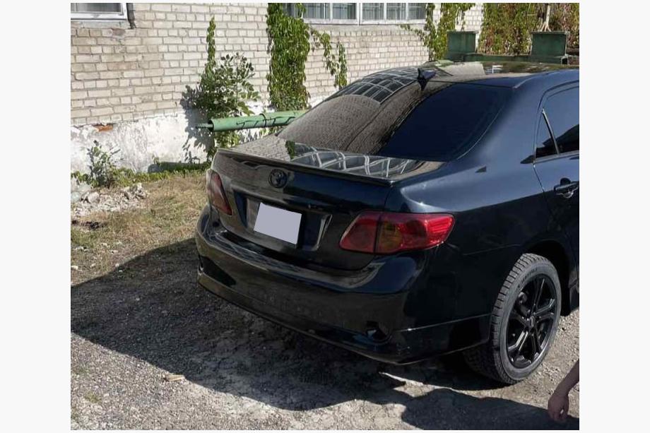 Toyota Corolla 2007-2013 Nakładka na tylny zderzak (gruntowana do lakierowania) Image