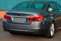 BMW 5 Series F10/F11 2010–2016 Listwa SD ze stali nierdzewnej nad tablicą rejestracyjną zdjęcia 6