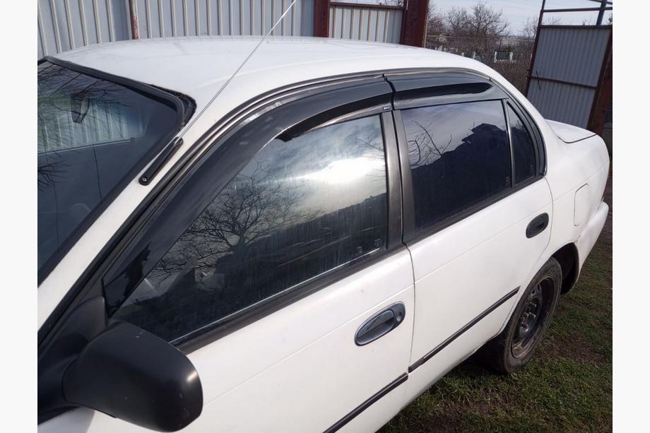 Toyota Corolla 1993-1998 Deflektory Okien (4 szt., Sunplex Sport) Image