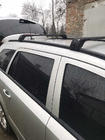 Opel Astra H 2004-2013 Bagażnik dachowy na zintegrowane relingi zamykany na klucz Skybar V2 (2 szt.) Czarne zdjęcia 3
