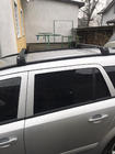Opel Astra H 2004-2013 Bagażnik dachowy na zintegrowane relingi zamykany na klucz Skybar V2 (2 szt.) Czarne zdjęcia 9