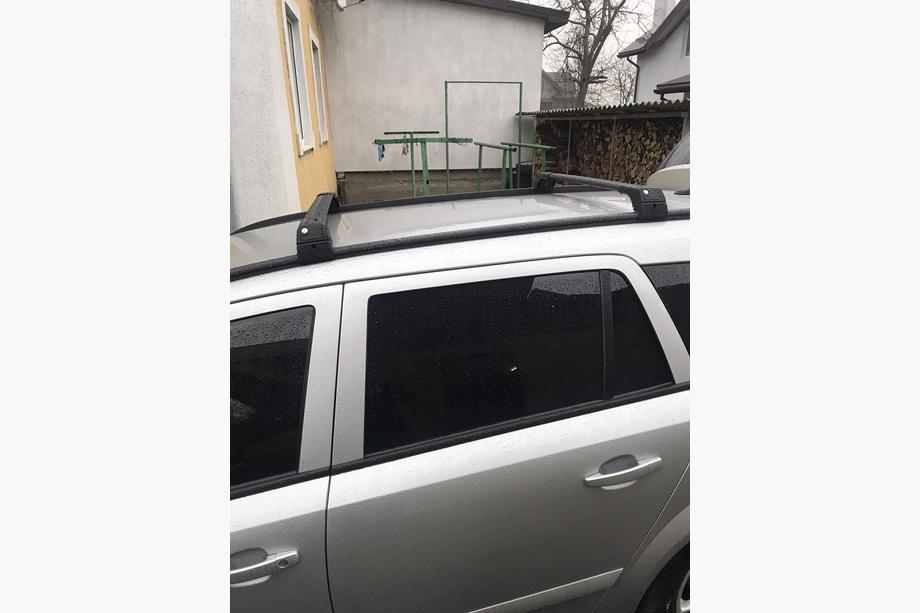 Opel Astra H 2004-2013 Bagażnik dachowy na zintegrowane relingi zamykany na klucz Skybar V2 (2 szt.) Zdjęcia 9