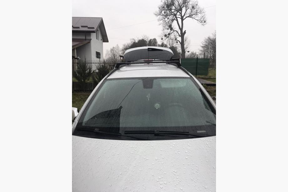Opel Astra H 2004-2013 Bagażnik dachowy na zintegrowane relingi zamykany na klucz Skybar V2 (2 szt.) Zdjęcia 10