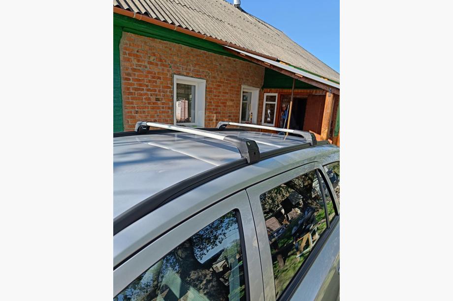 Opel Astra H 2004-2013 Bagażnik dachowy na zintegrowane relingi zamykany na klucz Skybar V2 (2 szt.) Zdjęcia 11