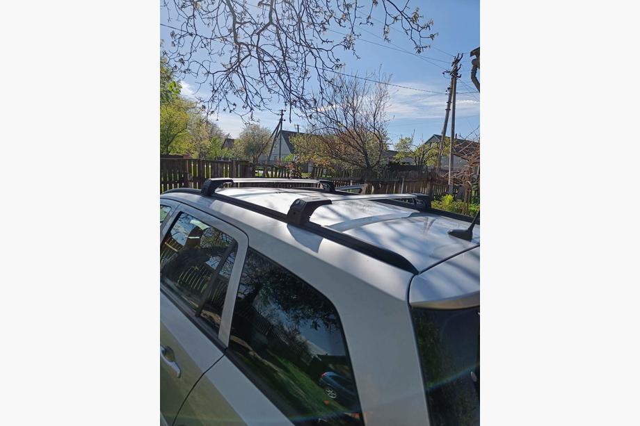 Opel Astra H 2004-2013 Bagażnik dachowy na zintegrowane relingi zamykany na klucz Skybar V2 (2 szt.) Zdjęcia 2